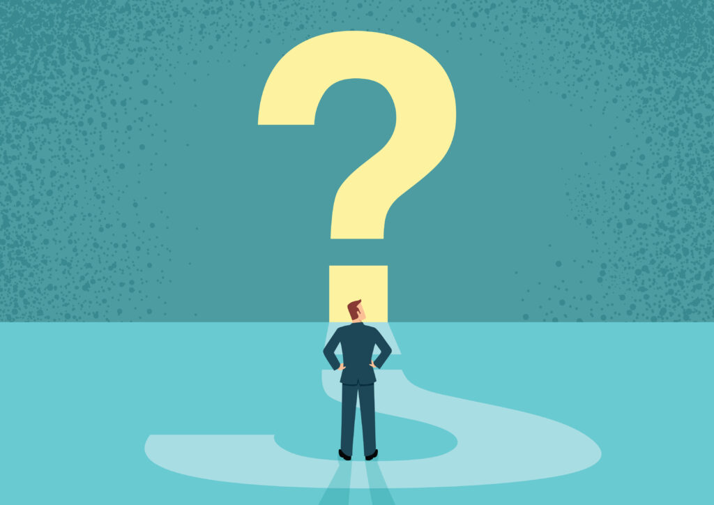 Simple flat vector illustration of a businessman looking at big question mark